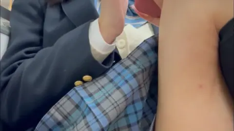 Asian Teen in School Uniform Exposes Herself on Public Transport