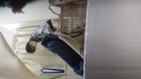 Asian Couple in Bedroom Intimacy