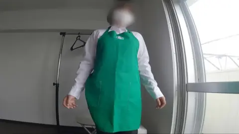 Asian woman in white mask teases with skirt