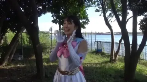 Asian Girl in Pink and Blue Outfits Outdoor