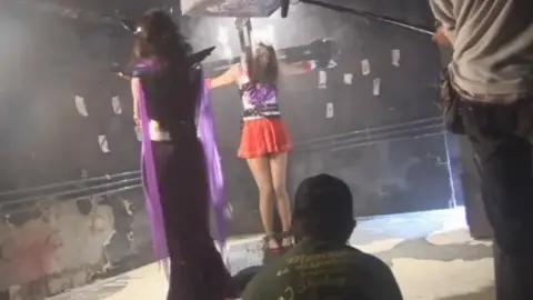 Asian Model in Bondage Costume