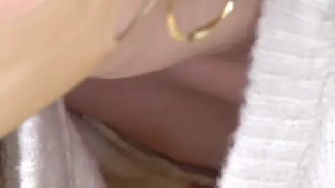 Asian teen with ponytail in intimate moments