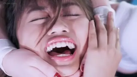 Asian Women Wrestling in Ring