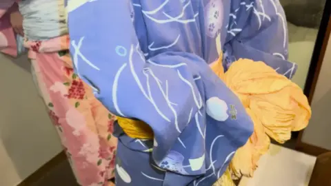 Asian Lesbians in Hotel Room Encounter