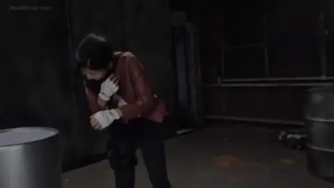 Asian Women in Leather Jackets in Dark Room