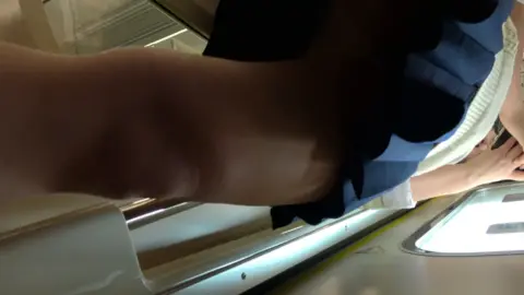 Asian Lesbians in Public Restroom