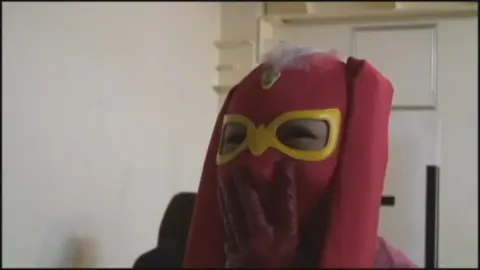 Asian Women in Red Masks and Gloves