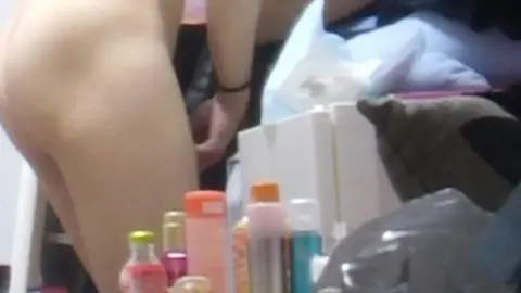 Asian Teen with Braids and Tattoo