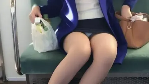 Asian Woman on Public Transportation
