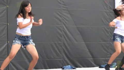 Asian Girls Dancing on Stage