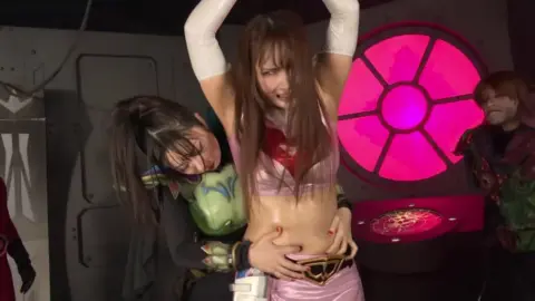 Asian Wrestlers in Costumes Engage in Dramatic Matches