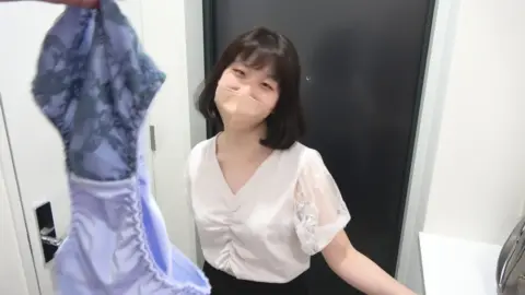 Asian Teen Undresses in Bathroom