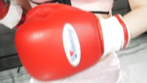 Asian Boxing Beauty in Red Gloves
