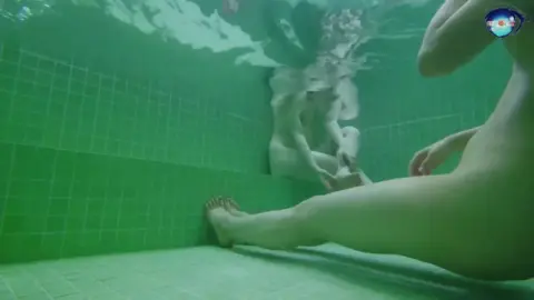 Blonde Twins Play Underwater