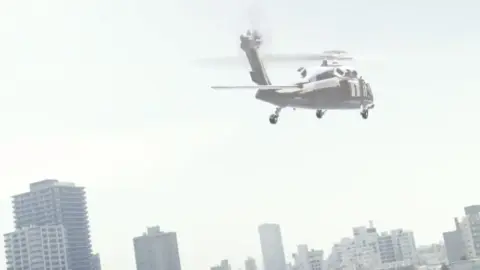 Asian Woman in Leather Outfit Restrained in Industrial Setting