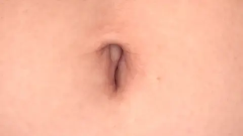 Asian Teen Shows Off in Living Room