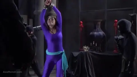 Asian Women in Unitards and Sashes