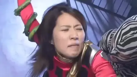 Asian Beauties in Red and Gold Costumes