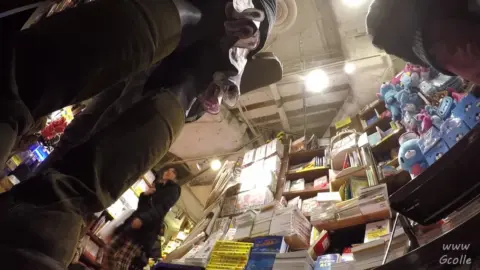 Asian Girls Try On Clothes in Store