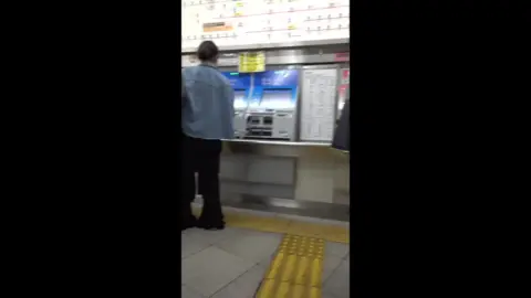 Asian Duo in Mall Encounter