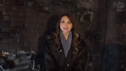 Asian Girls in Costumes Pose and Interact