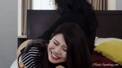 Asian Lesbians Spanking in Bedroom