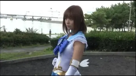 Asian Woman in Costume Fights with Staff