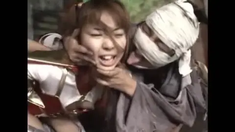 East Asian Woman Resists South Asian Man Outdoors