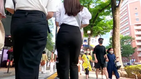 Asian Women on City Street