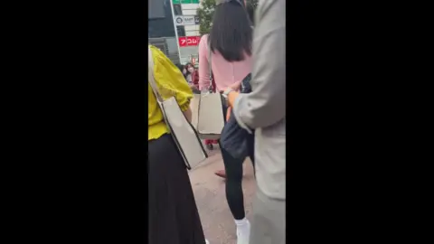 Asian Girls in City Streets