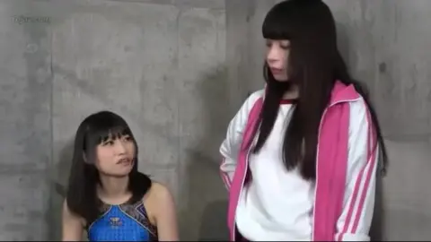 Asian Lesbians Wrestling in Ring