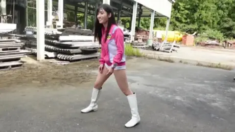 Group of Women Fighting and Walking