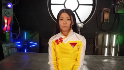 Asian Performers in Fantasy Costumes