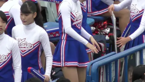 Asian Teen Cheerleaders in Blue Uniforms