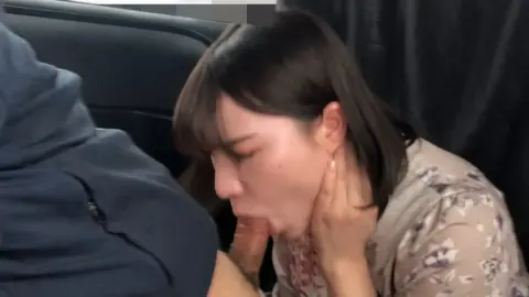 Caucasian Couple Having Sex in Vehicle