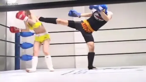 Asian Boxers in Yellow Bikini and Boxing Gloves