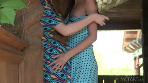 Lesbian Encounter on a Wooden Porch