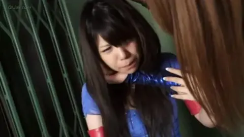 Asian Performers in Blue Costumes Dancing and Wrestling