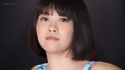 Asian Women Wrestling in Sports Bras