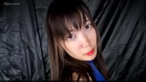 Asian Couple Engaging in Intimate Activity