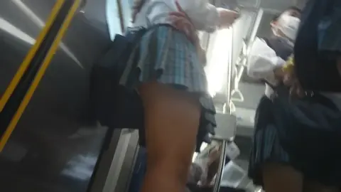 Asian Teens in Plaid Skirts on Public Transportation