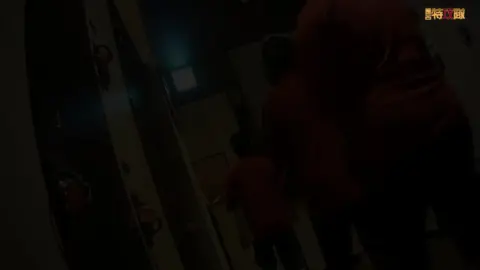 Asian teens undressing in bathroom