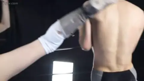 Asian Wrestlers in Purple Swimsuits