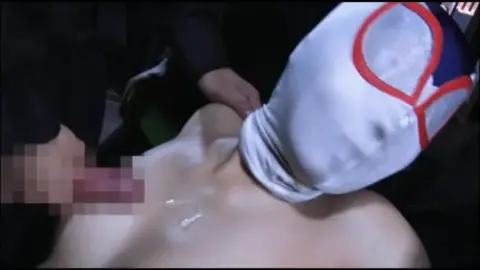 Asian Men in Wrestling Attire Engage in Restraint and Exposure