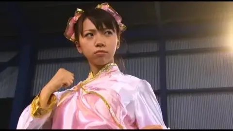 Asian Women in Wrestling Costumes Engage in Fights