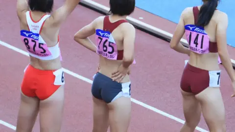 Asian Athletes in Sports Bras and Shorts