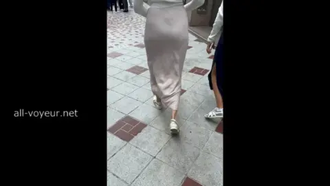 Blonde Asian Women in White Dresses Walking