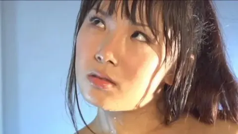 Asian Girl Gives Handjob in Bedroom