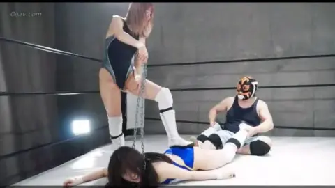 Asian Wrestlers Engage in Erotic Matches with Chains and Shoes