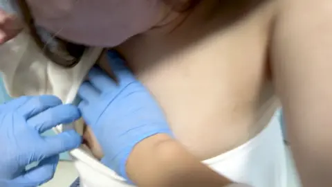 Asian Lesbians in Medical Exam Room
